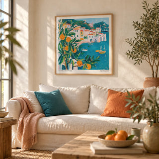 Amalfi Coast Print, framed on the wall of a relaxed living room with a warm white limewashed wall