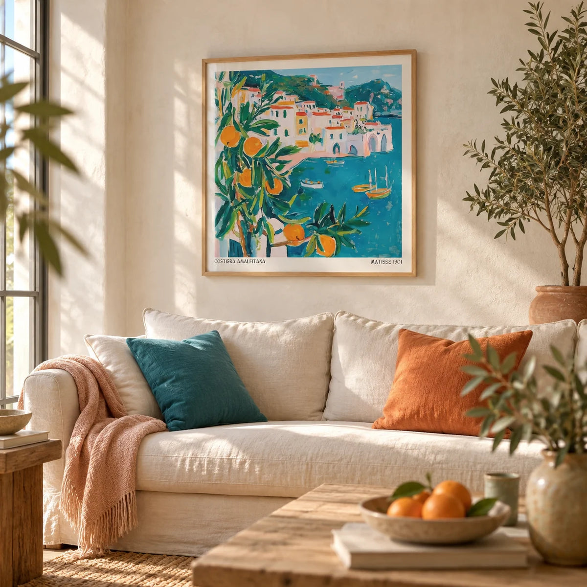 Amalfi Coast Print, framed on the wall of a relaxed living room with a warm white limewashed wall