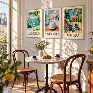 Amalfi Coast Prints Set of 3 styled above a marble bistro table in a sunny Parisian kitchen: Amalfi Limoncello, Morning Piazza and Amalfi Espresso shown framed side by side (frames not included)