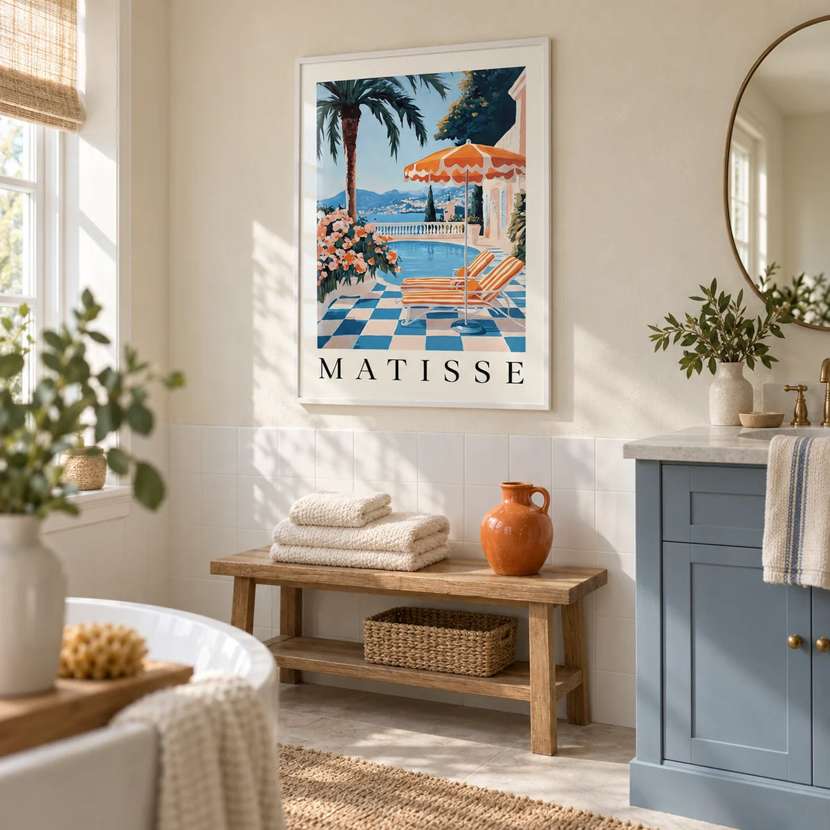 Amalfi Coast Wall Art Print, framed on the wall of a bright coastal-inspired bathroom in a UK home with cream plaster above plain white tiles and a muted blue vanity