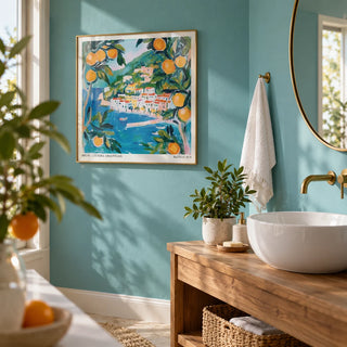 Amalfi Wall Art, framed on the wall of a fresh bathroom with a turquoise painted wall and a white basin on a wooden stand