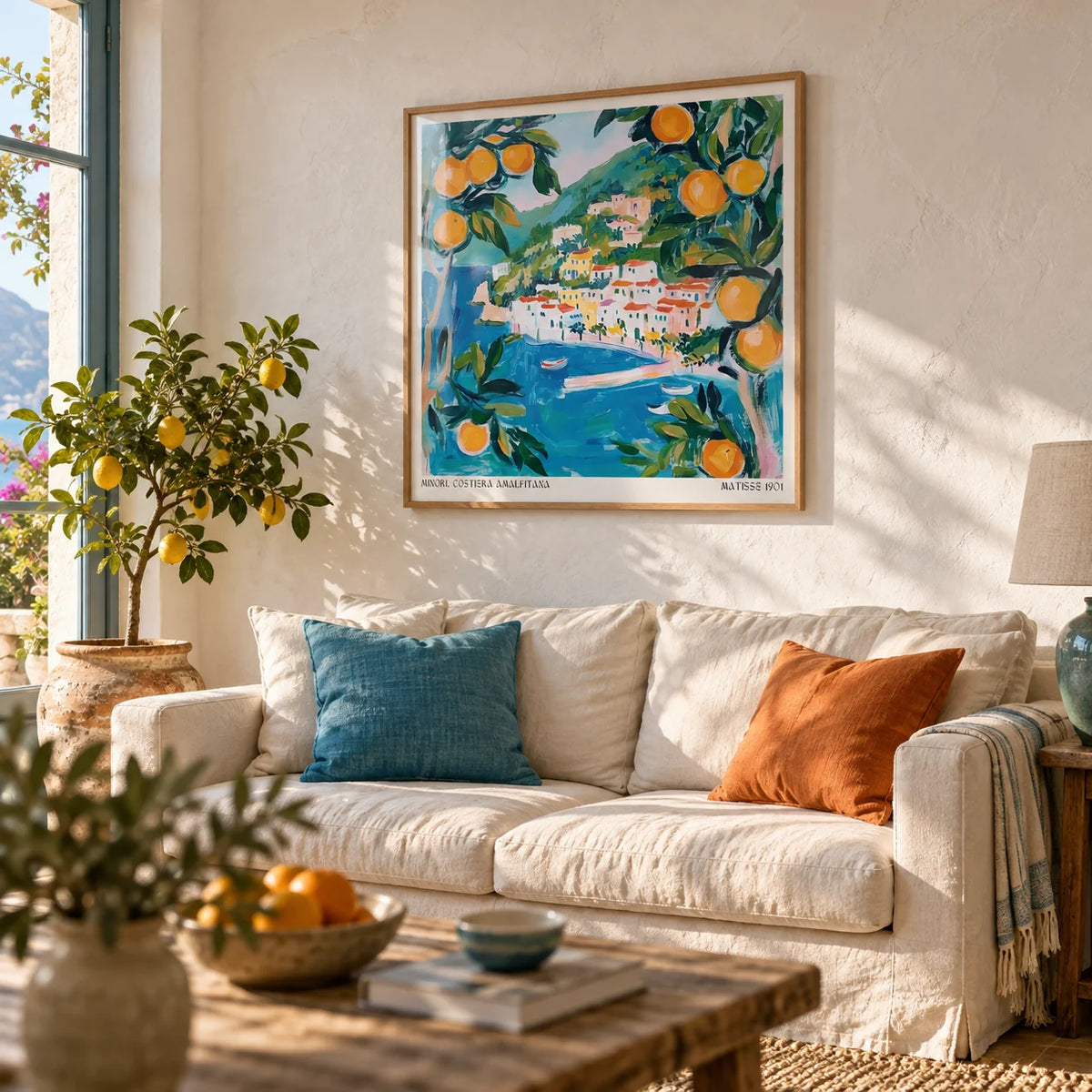 Amalfi Wall Art, framed on the wall of a relaxed Mediterranean living room with a limewashed white wall