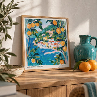 Amalfi Wall Art, a small A4 framed print leaning on a wooden shelf in a living room