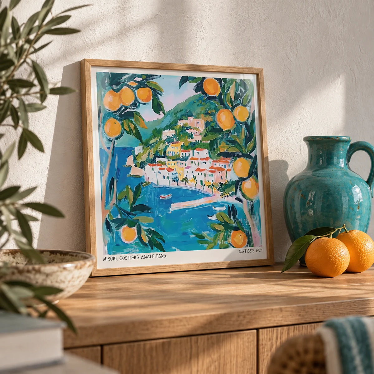 Amalfi Wall Art, a small A4 framed print leaning on a wooden shelf in a living room