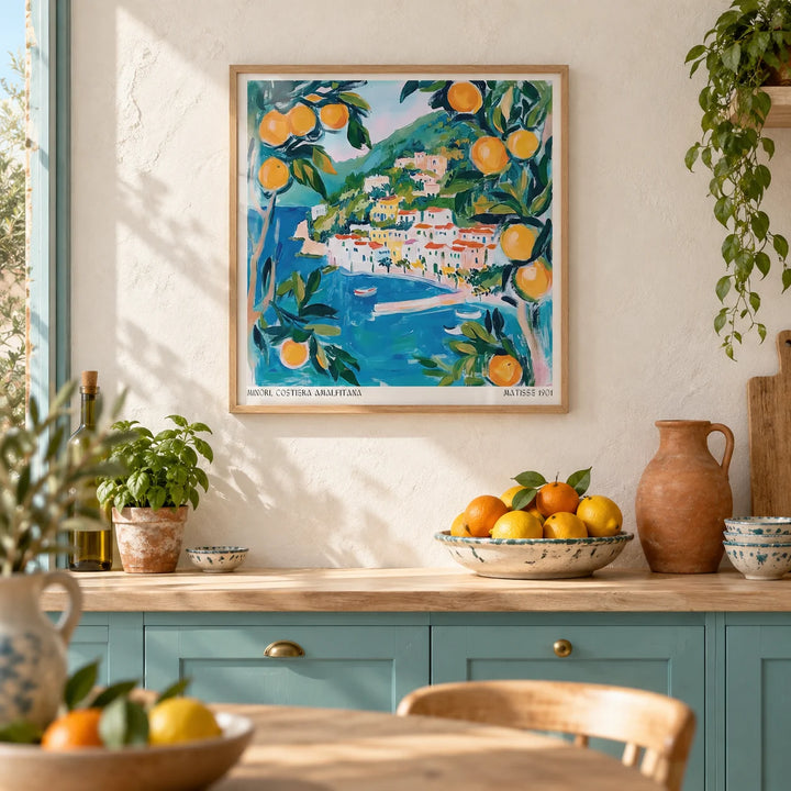 Amalfi Wall Art, framed on the wall of a sunny Mediterranean kitchen with a limewashed white wall and turquoise painted cabinets