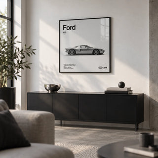 American Supercar Poster, framed on the wall of a design-led city flat living room with a white wall and a concrete floor