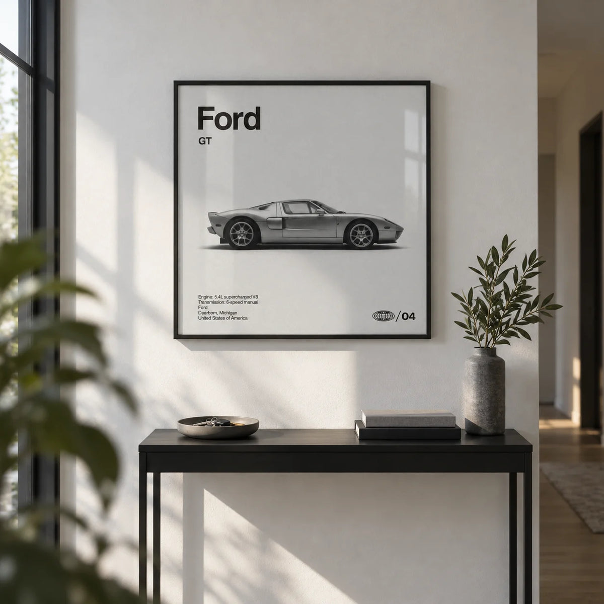 American Supercar Poster, framed on the wall of a modern hallway with a white wall