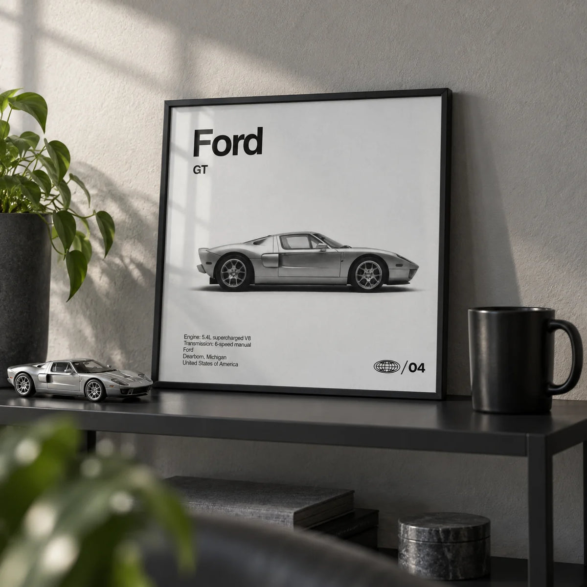 American Supercar Poster, a small A4 framed print leaning on a black metal shelf in a living room