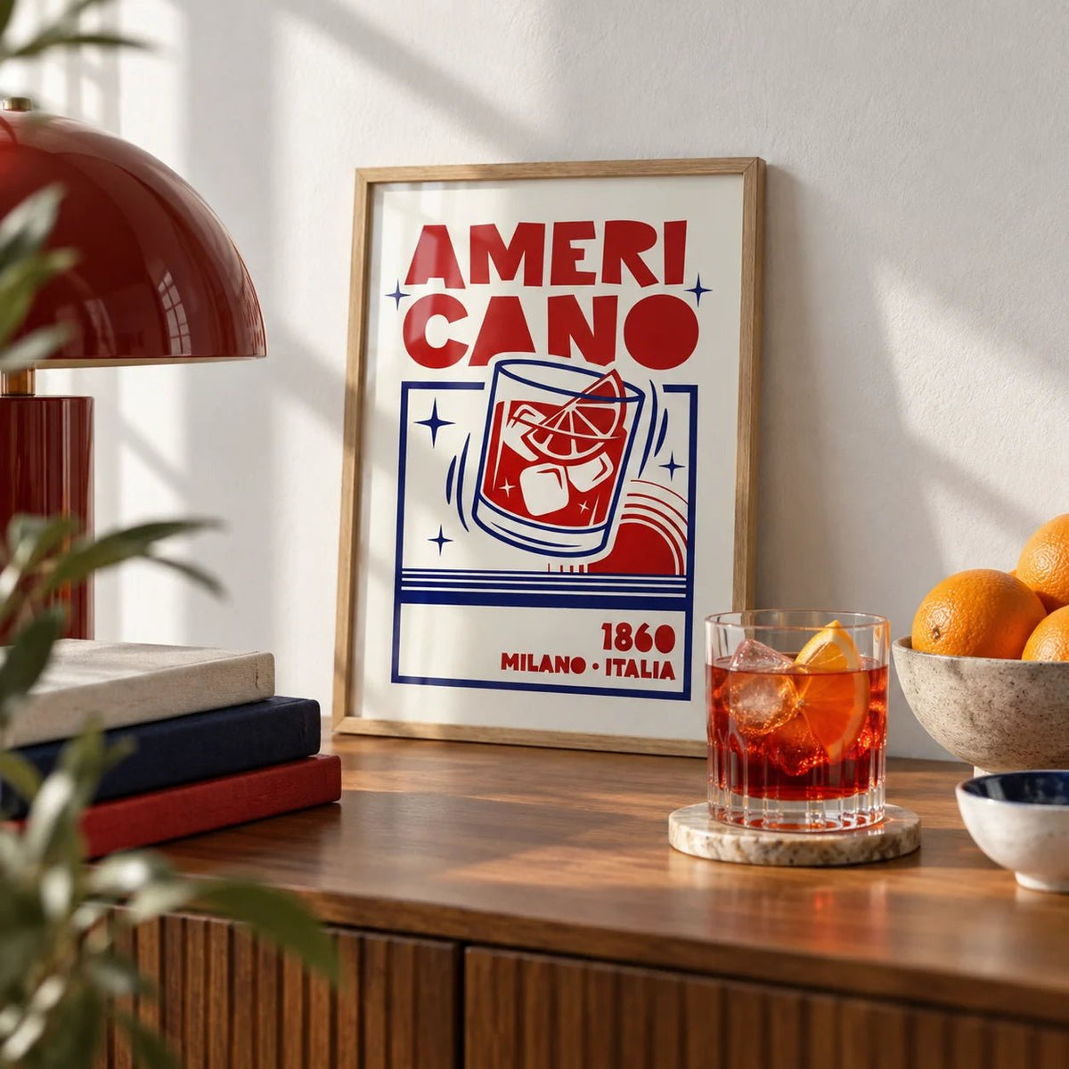 Americano Cocktail Poster, a small A4 framed print leaning on a sideboard in a living room