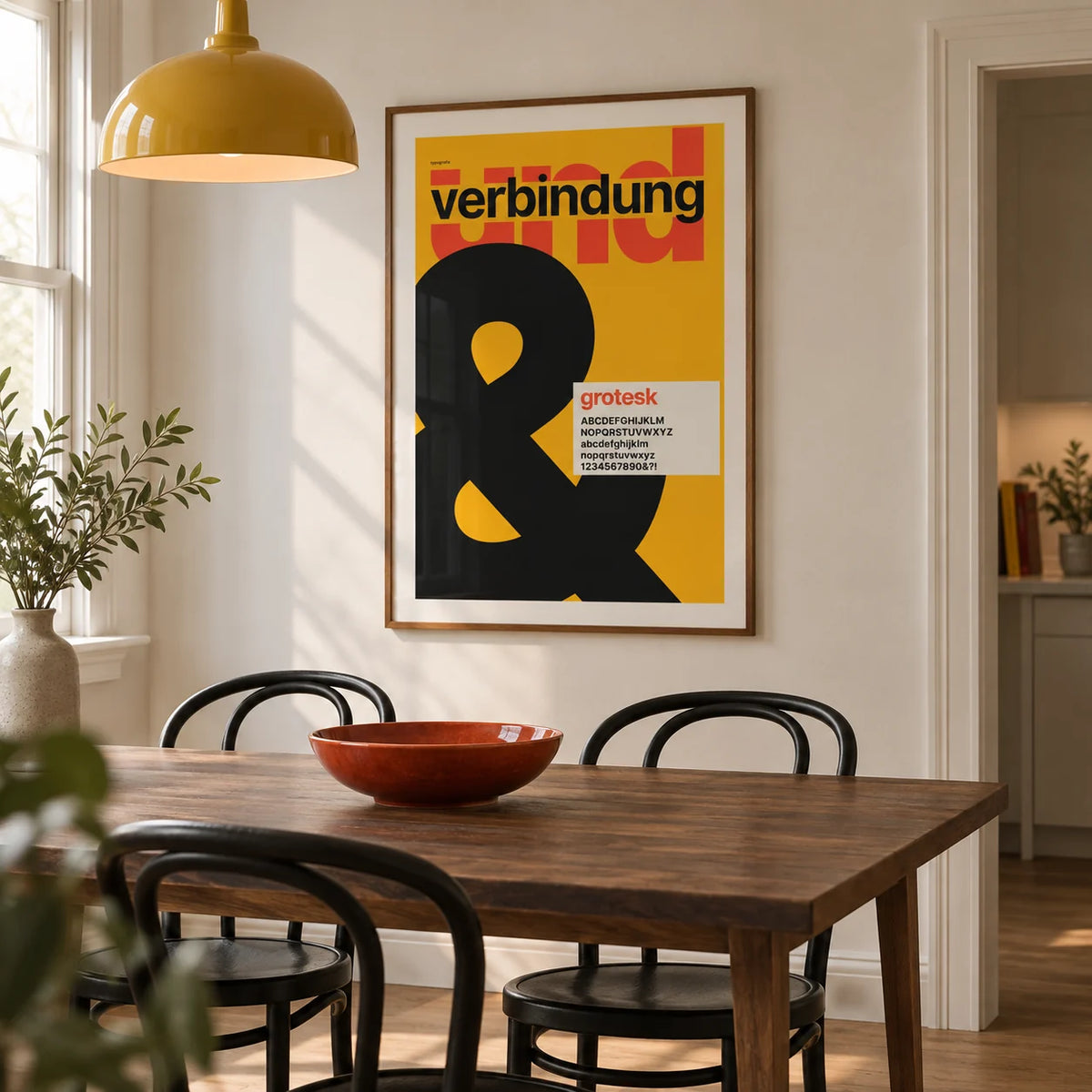 Ampersand Print, framed on the wall of a compact modern dining room in a UK terraced house with an off-white wall
