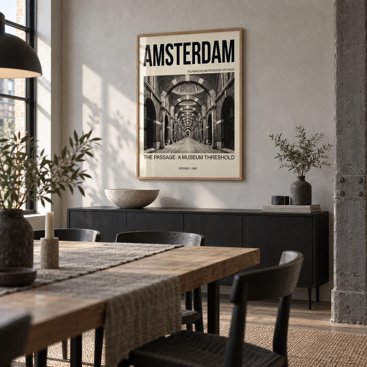 Amsterdam Passage Wall Art, framed on the wall of a design-led dining room in a converted UK warehouse flat with a pale grey plaster wall and a visible structural column
