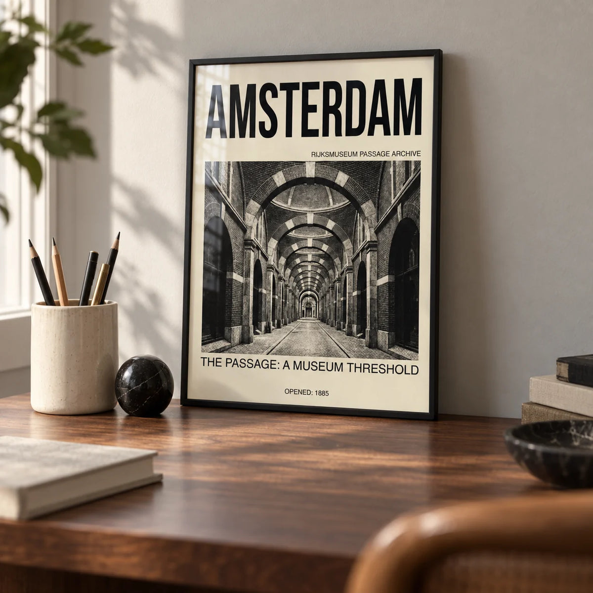 Amsterdam Passage Wall Art, a small A4 framed print leaning on a walnut desk