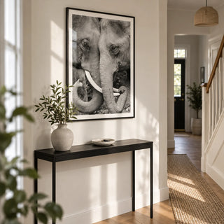 Animal Portrait Art, framed on the wall of a welcoming hallway in a renovated UK semi-detached home with an off-white wall and simple oak floorboards
