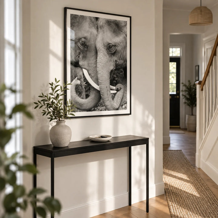Animal Portrait Art, framed on the wall of a welcoming hallway in a renovated UK semi-detached home with an off-white wall and simple oak floorboards