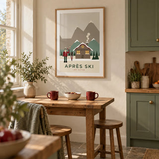 Apres Ski Poster, framed on the wall of a cosy kitchen breakfast corner in a UK cottage with cream plaster walls and sage green cabinets