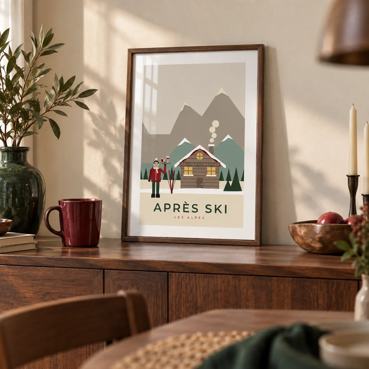 Apres Ski Poster, a small A4 framed print leaning on a walnut sideboard in a dining room
