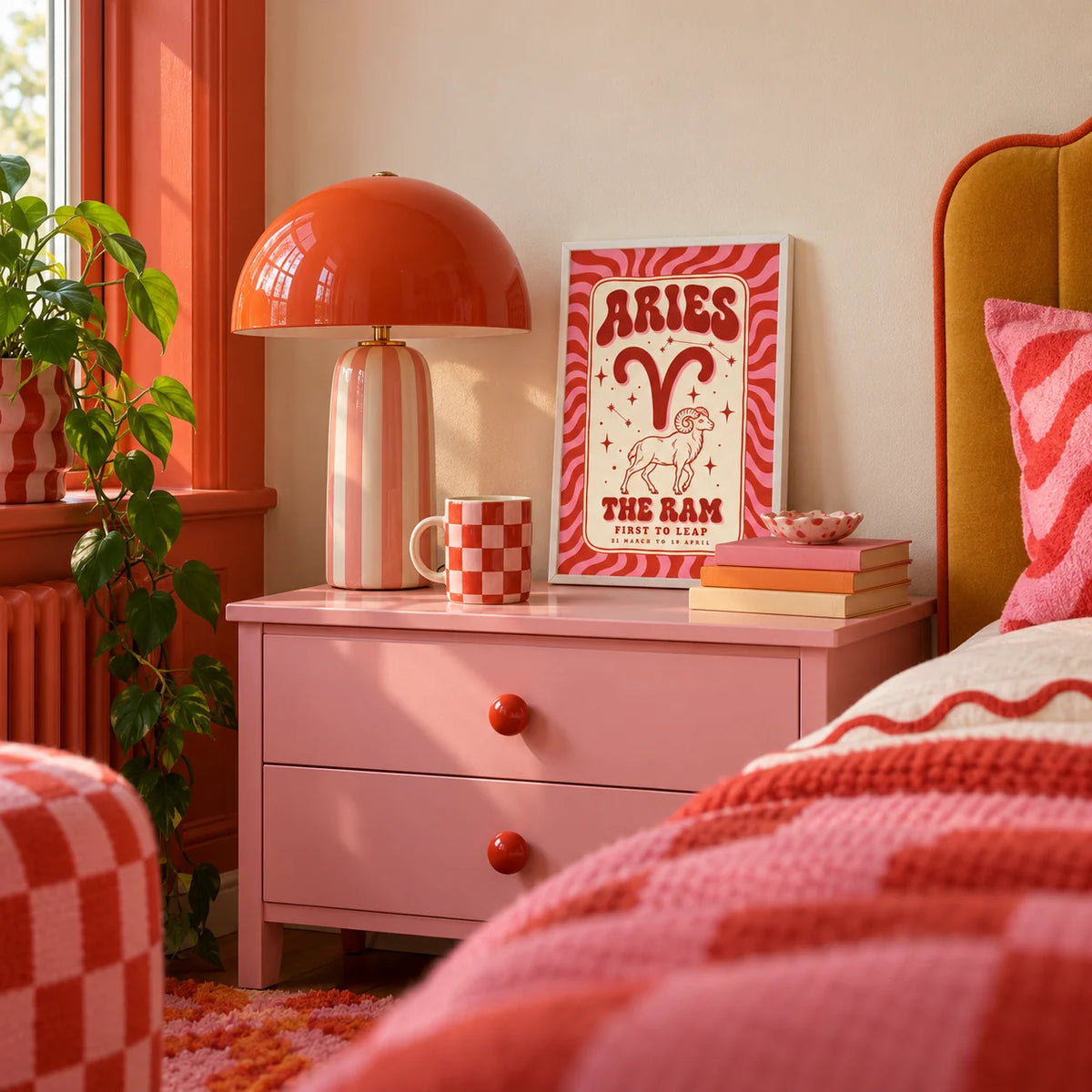 Aries Print, a small A4 framed print leaning on a bedside table