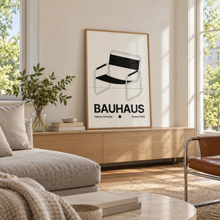 Armchair Print, framed on the wall of a light living room with big windows