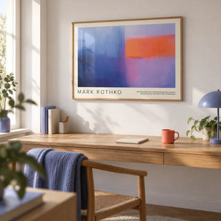 Art by Mark Rothko, framed on the wall of a quiet home office with a white wall