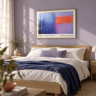 Art by Mark Rothko, framed on the wall of a serene bedroom with a soft lavender wall