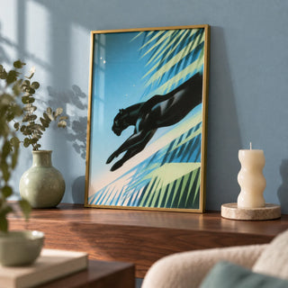 Art Deco Black Panther Print, a small A4 framed print leaning on a walnut shelf in a living room