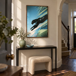 Art Deco Black Panther Print, framed on the wall of a welcoming hallway in a UK terraced house with a cream wall