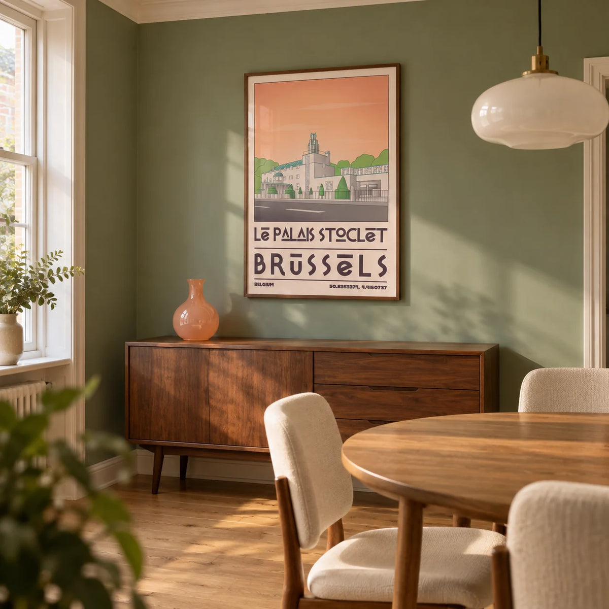 Art Deco Brussels Print, framed on the wall of a small dining room in a British 1930s semi with a muted green wall