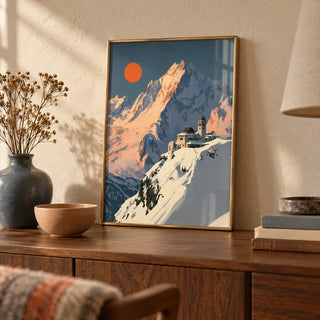 Art Deco Mountain Poster, a small A4 framed print leaning on a walnut sideboard in a living room