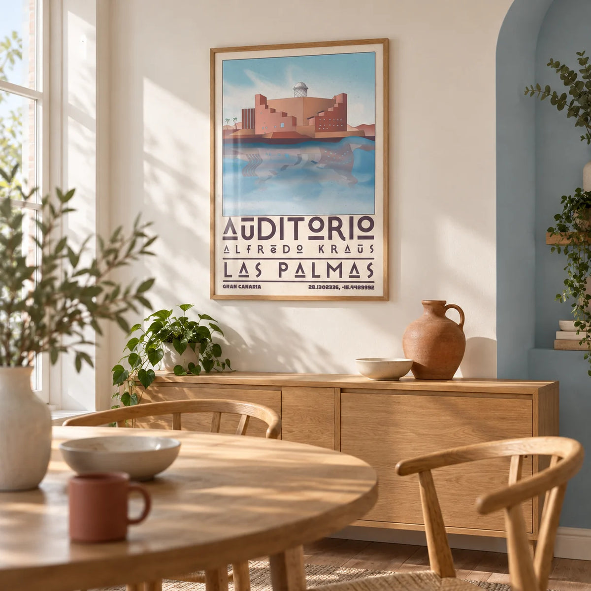 Art Las Palmas, framed on the wall of a bright dining room in a renovated UK terrace with warm white walls and a pale blue painted alcove