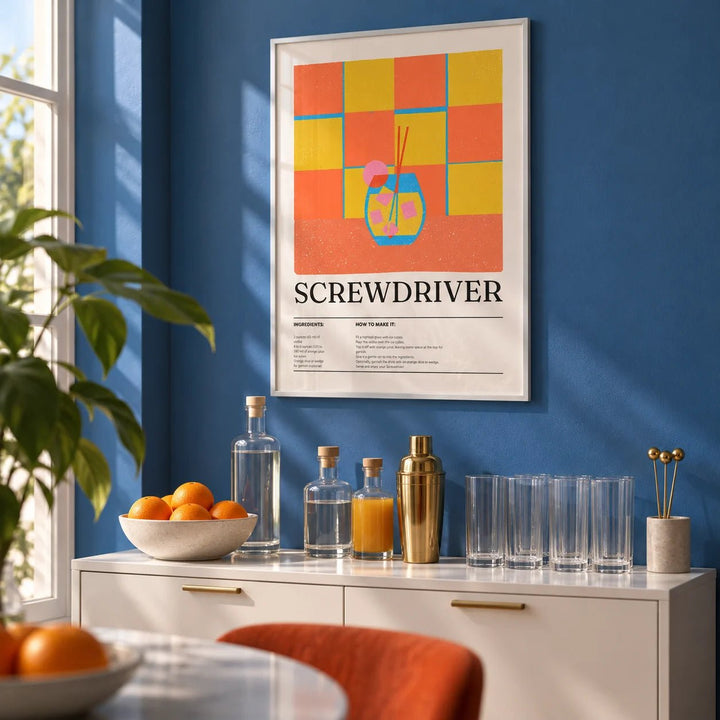 Art Prints Kitchen, framed on the wall of a small home bar with a solid blue painted wall