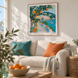 Art Prints of Italy, framed on the wall of a light coastal living room with a soft white wall