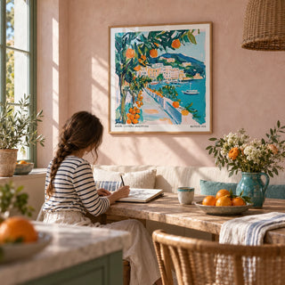 Art Prints of Italy, framed on the wall of a sunny kitchen-diner with a pale pink limewashed wall