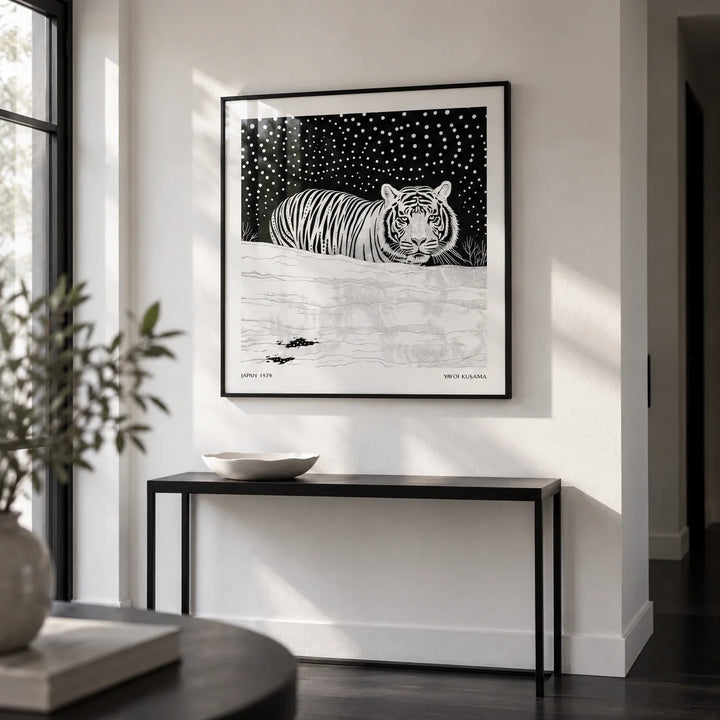 Art White Tiger, framed on the wall of a crisp hallway with a white wall and a black floor