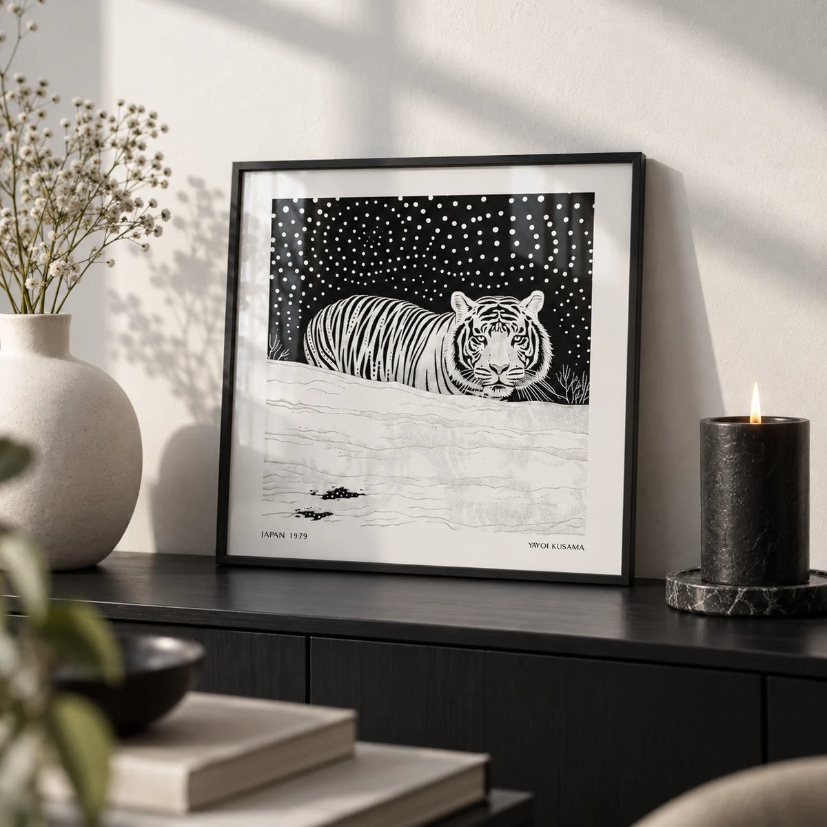 Art White Tiger, a small A4 framed print leaning on a black shelf in a living room
