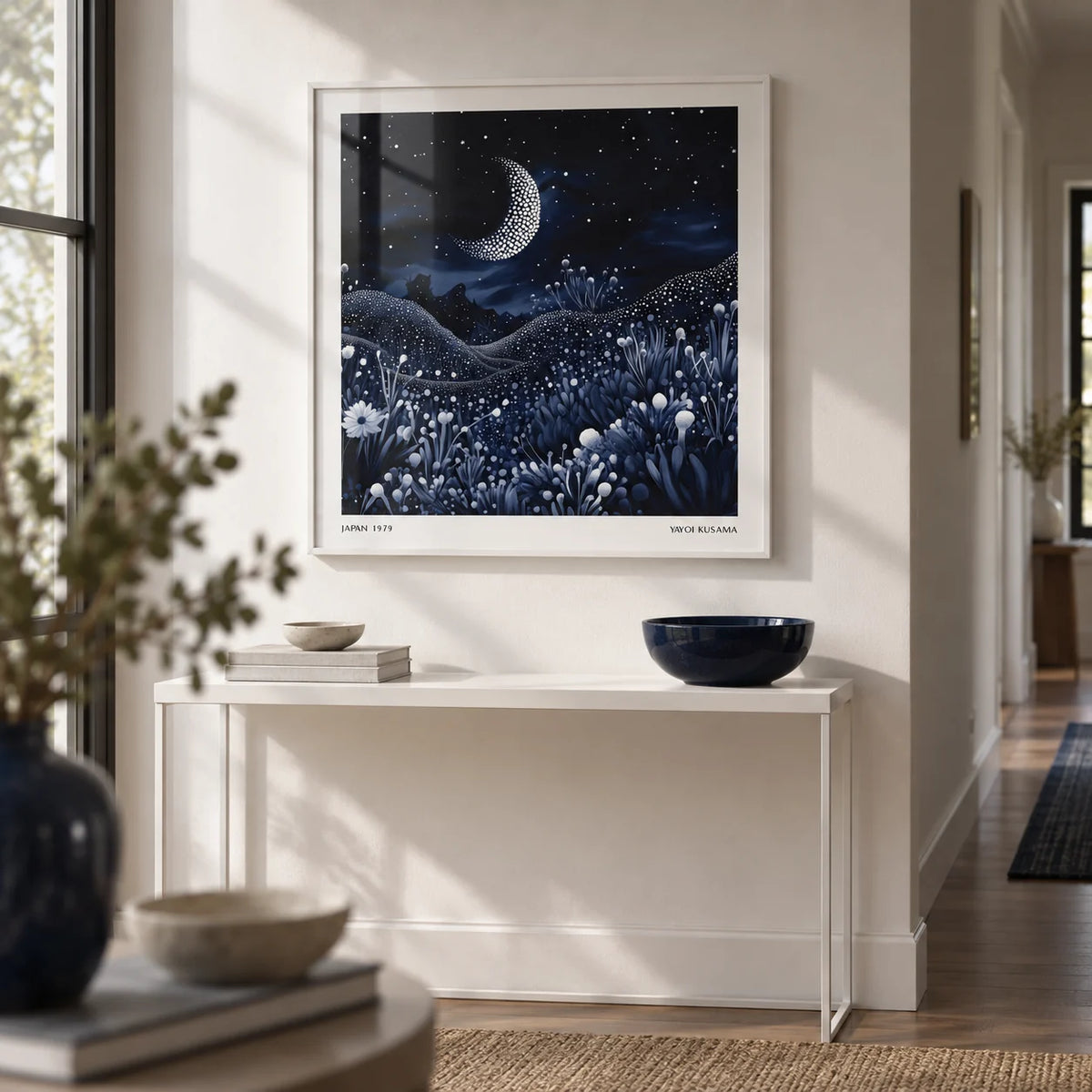 Art with the Moon, framed on the wall of a calm hallway with a white wall