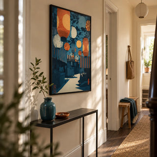 Asian Festival Art Print, framed on the wall of a welcoming narrow hallway in a renovated UK terrace with pale cream walls and dark wood flooring