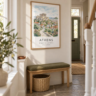 Athens Art Print, framed on the wall of a bright narrow hallway in a UK terraced house with warm white walls and a simple stone floor