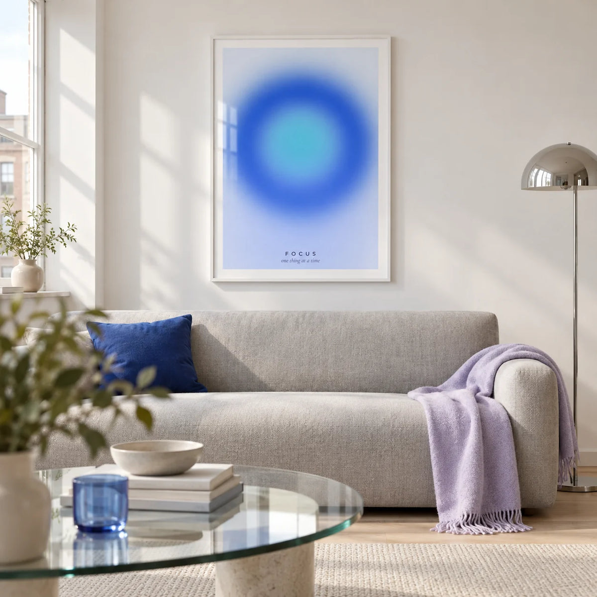 Aura Poster, framed on the wall of a contemporary living room in a UK city flat with a chalk white wall