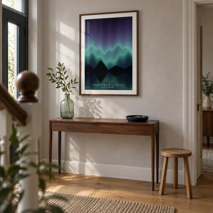 Aurora Borealis Print, framed on the wall of a welcoming hallway in a renovated UK terrace with a pale grey plaster wall and oak floorboards