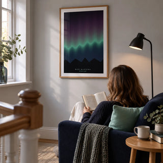 Aurora Print, framed on the wall of a quiet reading corner on a broad landing in a UK home with a pale grey wall in a living room
