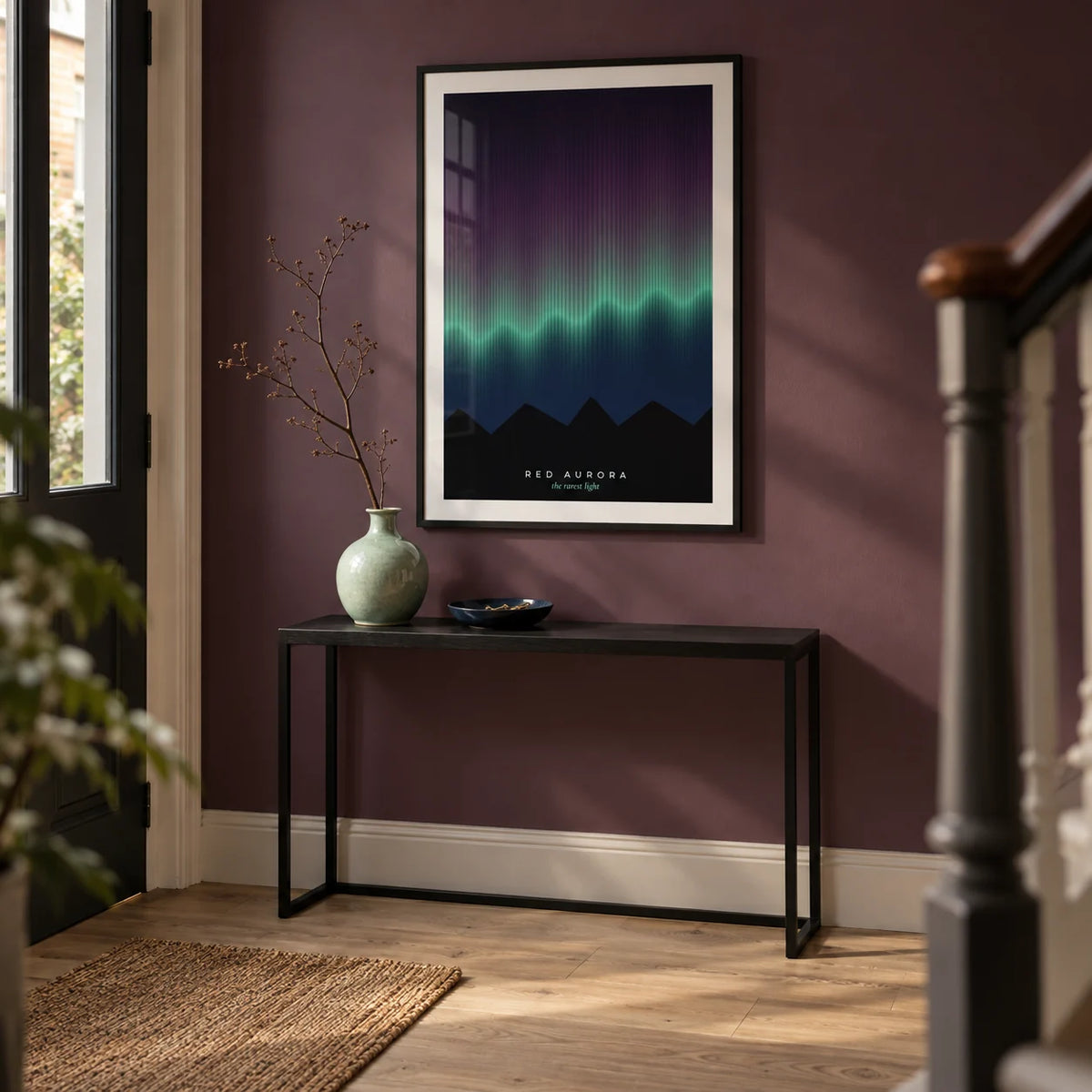 Aurora Print, framed on the wall of a welcoming hallway in a renovated UK terrace with a muted plum wall and pale oak floor