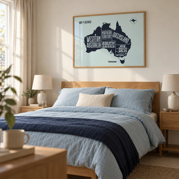 Australia Map Print, framed on the wall of a calm modern bedroom for an Australian expat couple in a UK home with a warm white wall