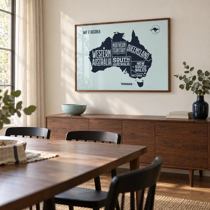 Australia Map Print, framed on the wall of a contemporary dining room in a UK home with a warm off-white wall and walnut floorboards