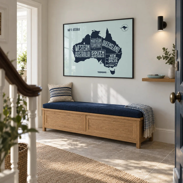 Australia Map Print, framed on the wall of a spacious entrance hallway in a renovated UK terrace with a pale grey wall and large plain stone floor tiles