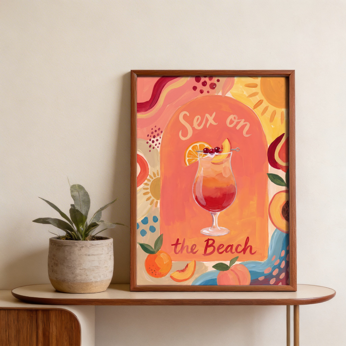 Framed-view cocktail wall art print with cherries, citrus slice, and brush-painted background