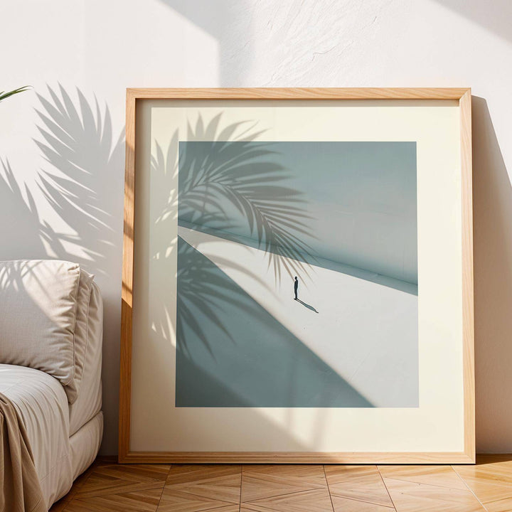 Framed Art Prints Square showing a solitary person in shadow with soft natural light and plant shadow overlay