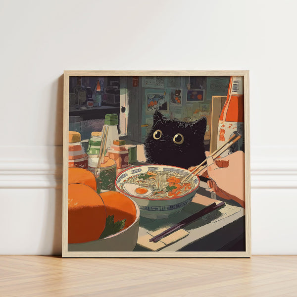 Black cat staring at ramen bowl in ramen wall art with warm kitchen tones.
