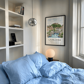 Typography Ljubljana Art Print with LJUBLJANA text, coordinates, and city illustration