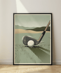 Close-up wall art print showing a 7 iron clubhead, dimpled golf ball, and grass foreground