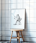 Frog Reading Art Print in black and white featuring a frog with an open book